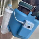 Close up of horse with inhaler on its nose